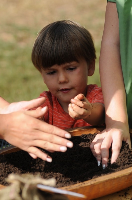 Child with compost